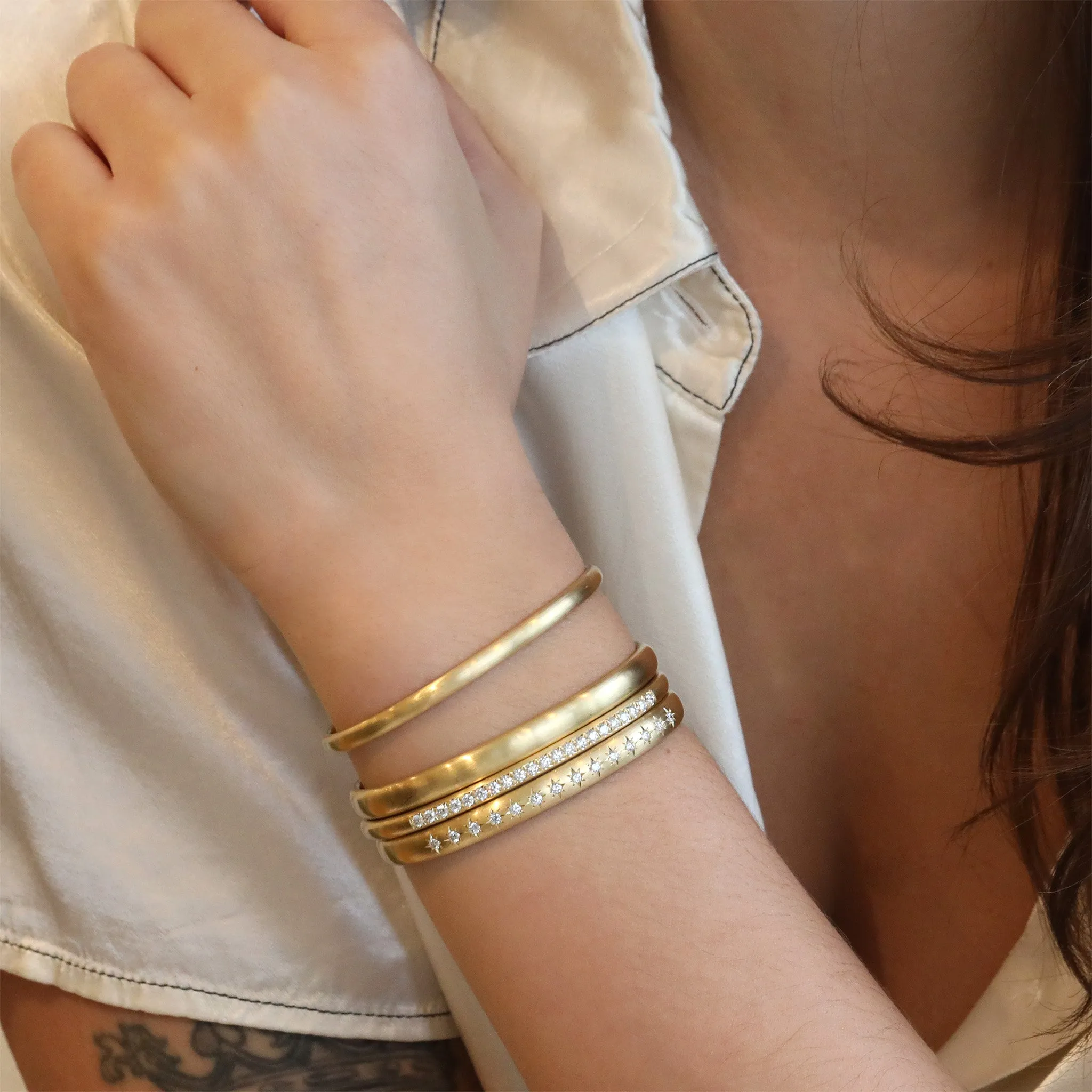 18K Rounded Cuff Bracelet with 14 Star-Set Diamonds