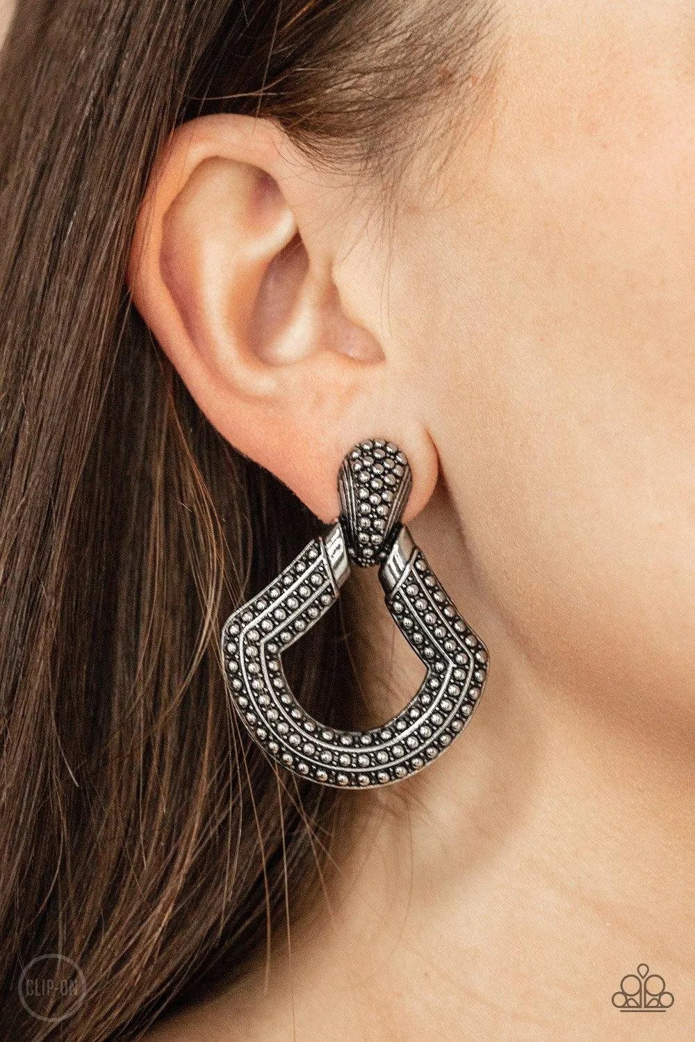 Better Buckle Up Silver
Clip-On Earrings Paparazzi
