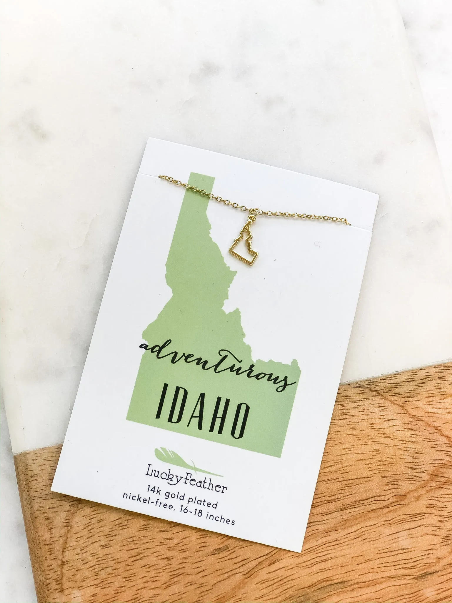 Petite State Outline Pendant Necklaces by Lucky Feather - Idaho