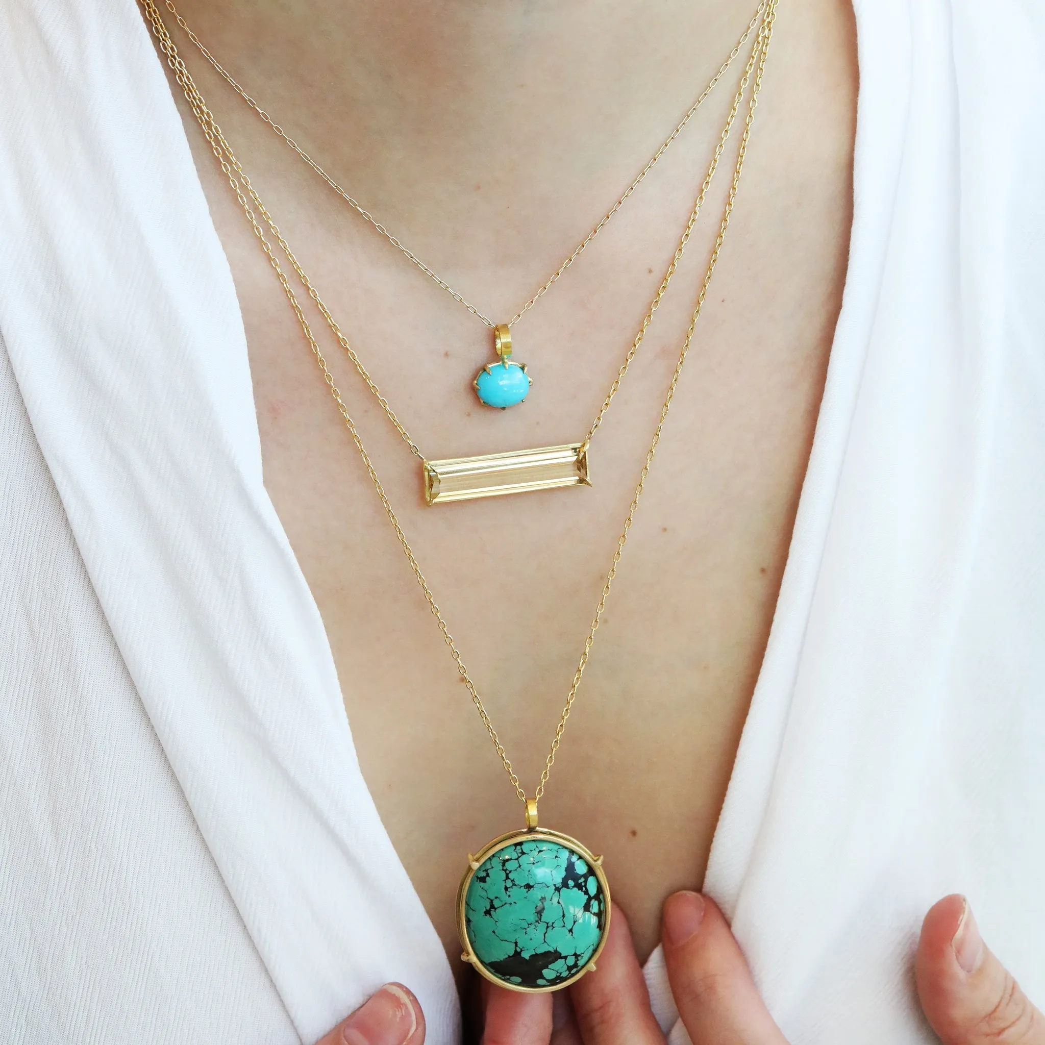 Prong-Set Oval Sleeping Beauty Turquoise Pendant