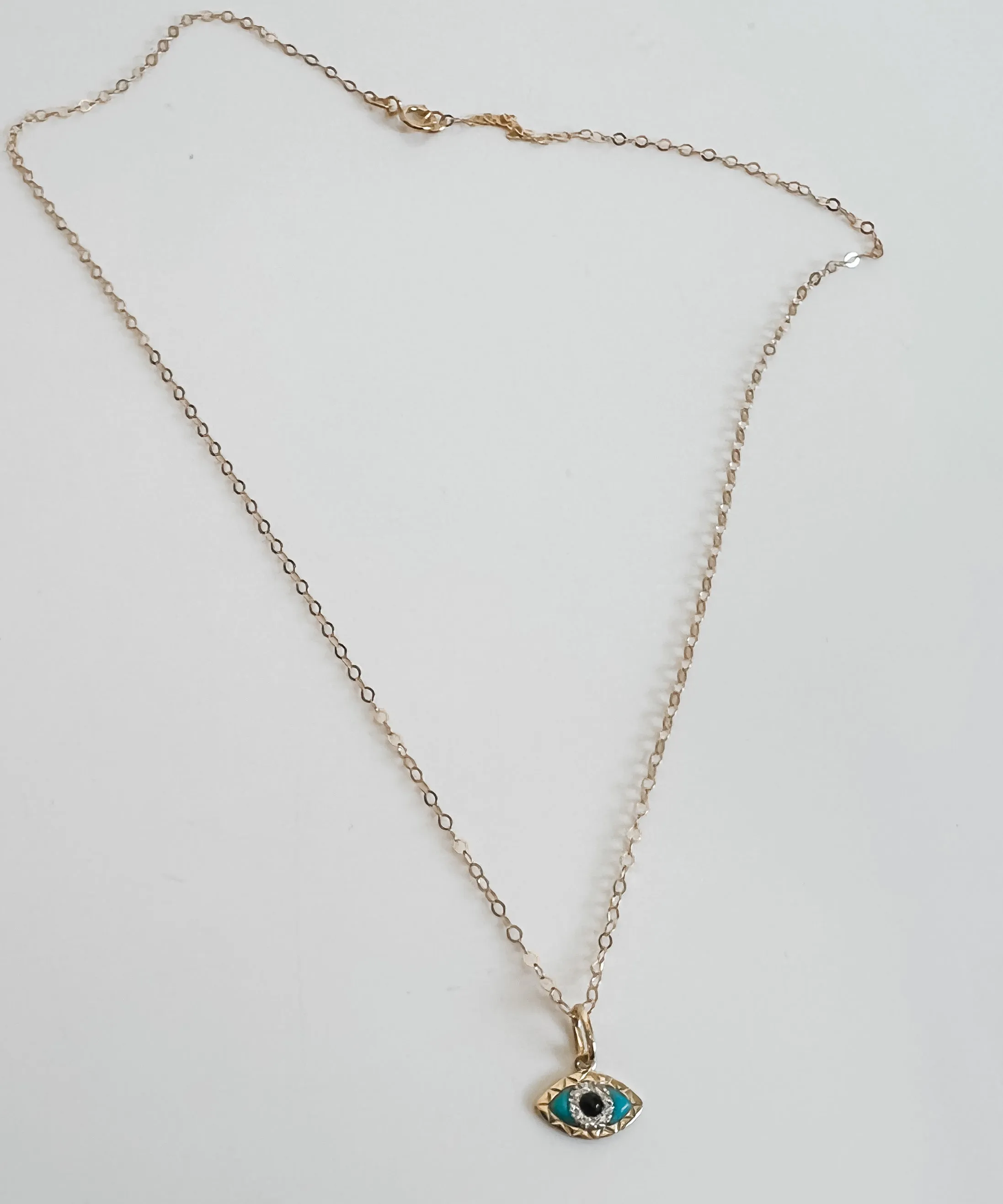 SOLID 14k EVIL EYE